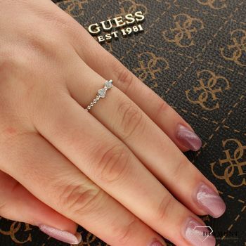 Pierścionek złoty z brylantem R61161R pierścionek białe złoto pierścionek z brylantem. Nowoczesny pierścionek w kształcie kokardki 6 diamentów o wielkości 0,03 ct, barwie H oraz czystości SI..jpg
